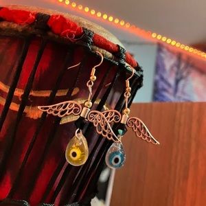 Angel wing eye-drop earrings